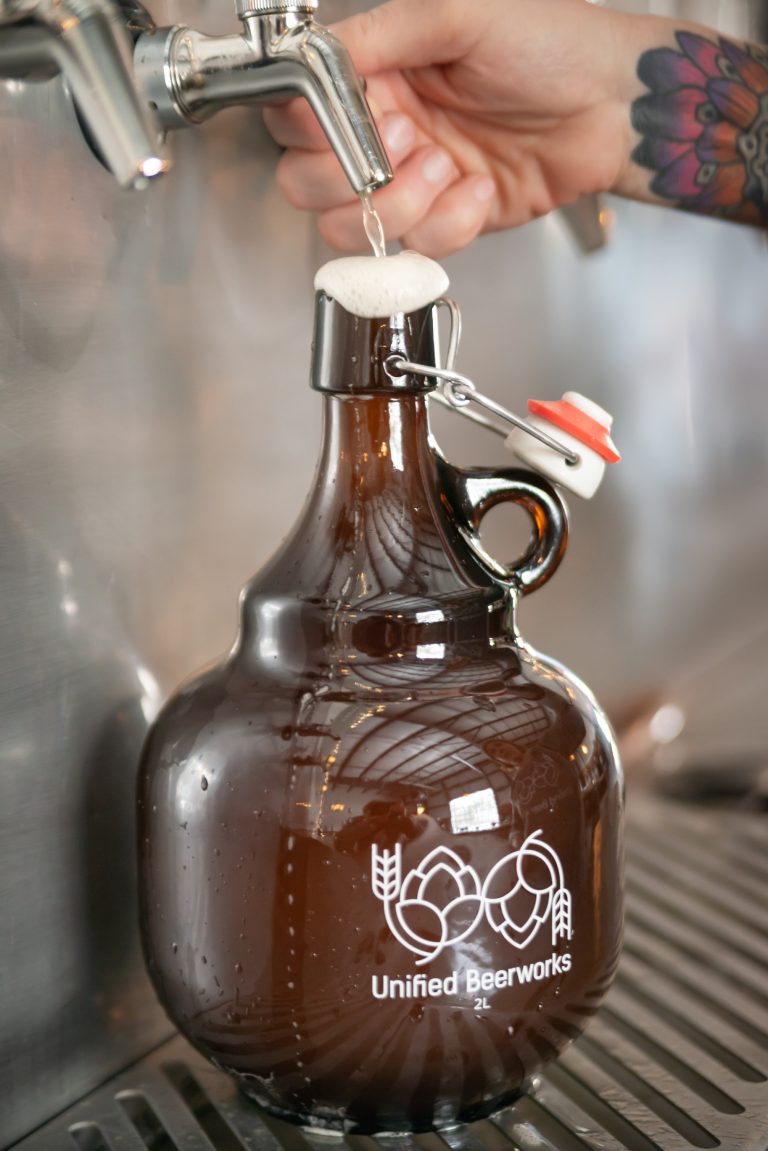 Pouring beer into a growler