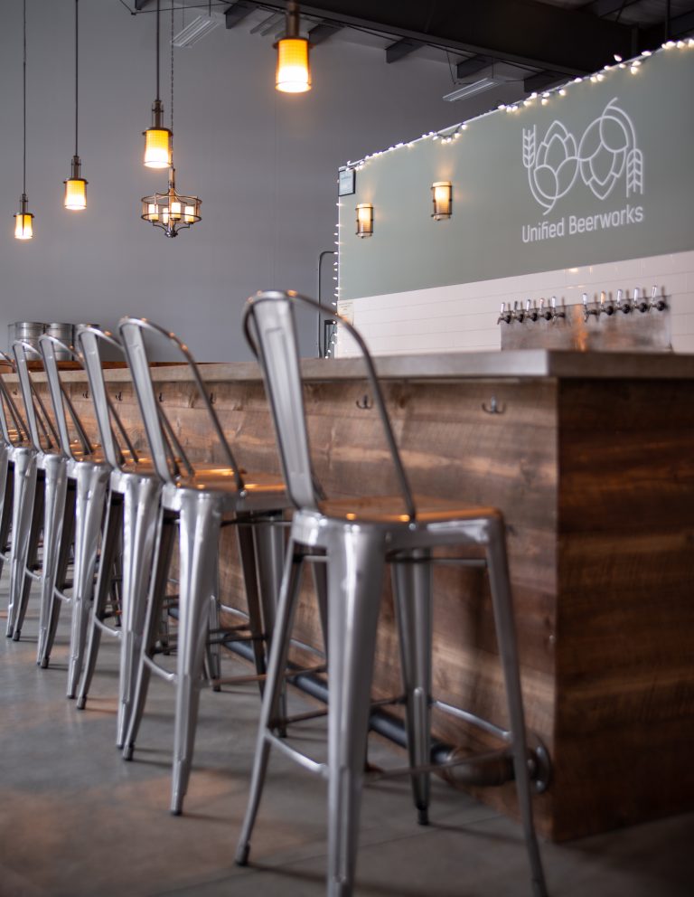 Unified taproom bar with chairs
